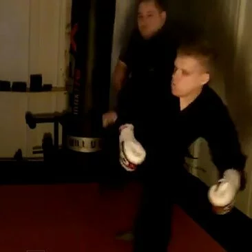 Blind Man unloadig some decent mma and karate combos on his personal trainer in the gym.