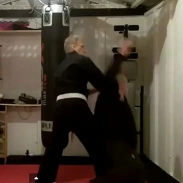 Crossbody Takedown Technique to drop an attacker
